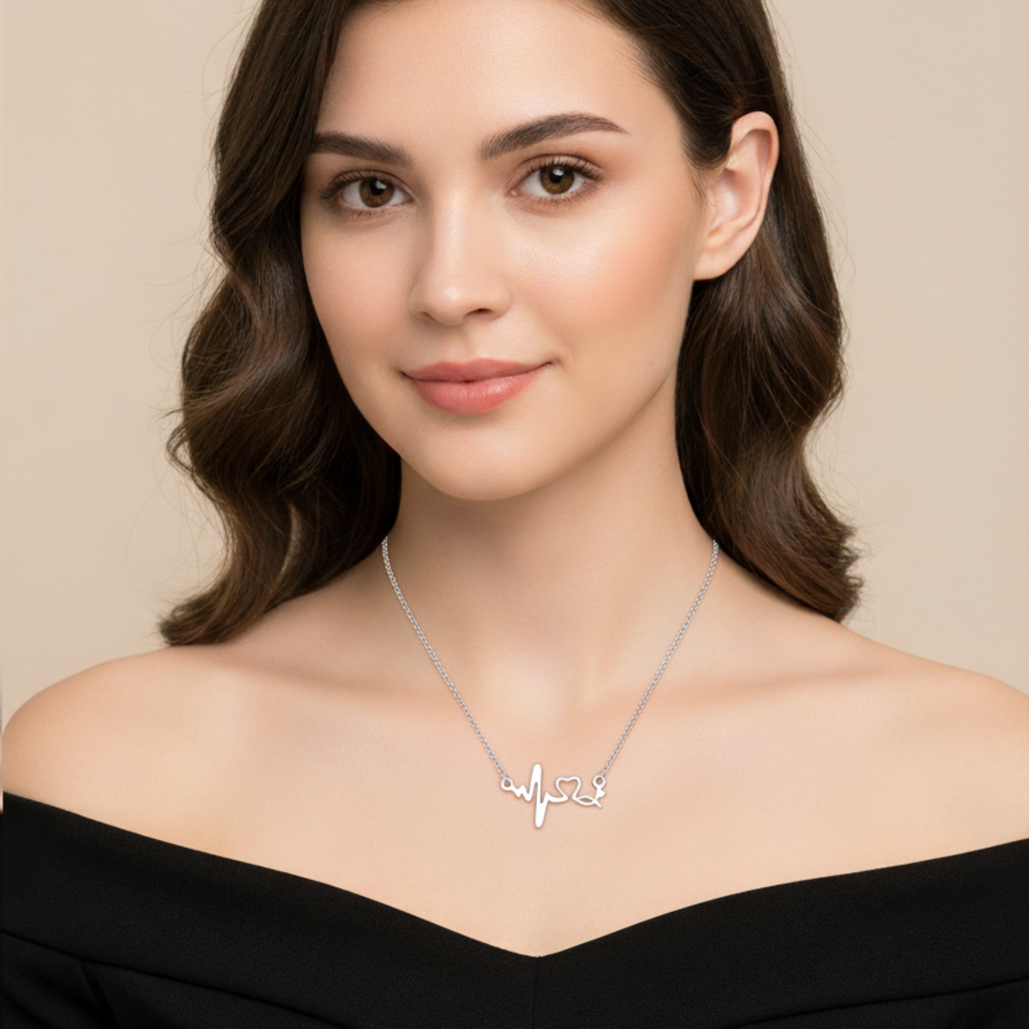 Woman wearing a silver necklace with a heart-shaped pendant on a beige background