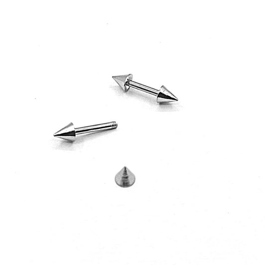 Two metallic spike earrings on a white background