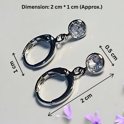 Pair of silver hoop earrings with clear gemstones, shown with measurements on a light gray background.
