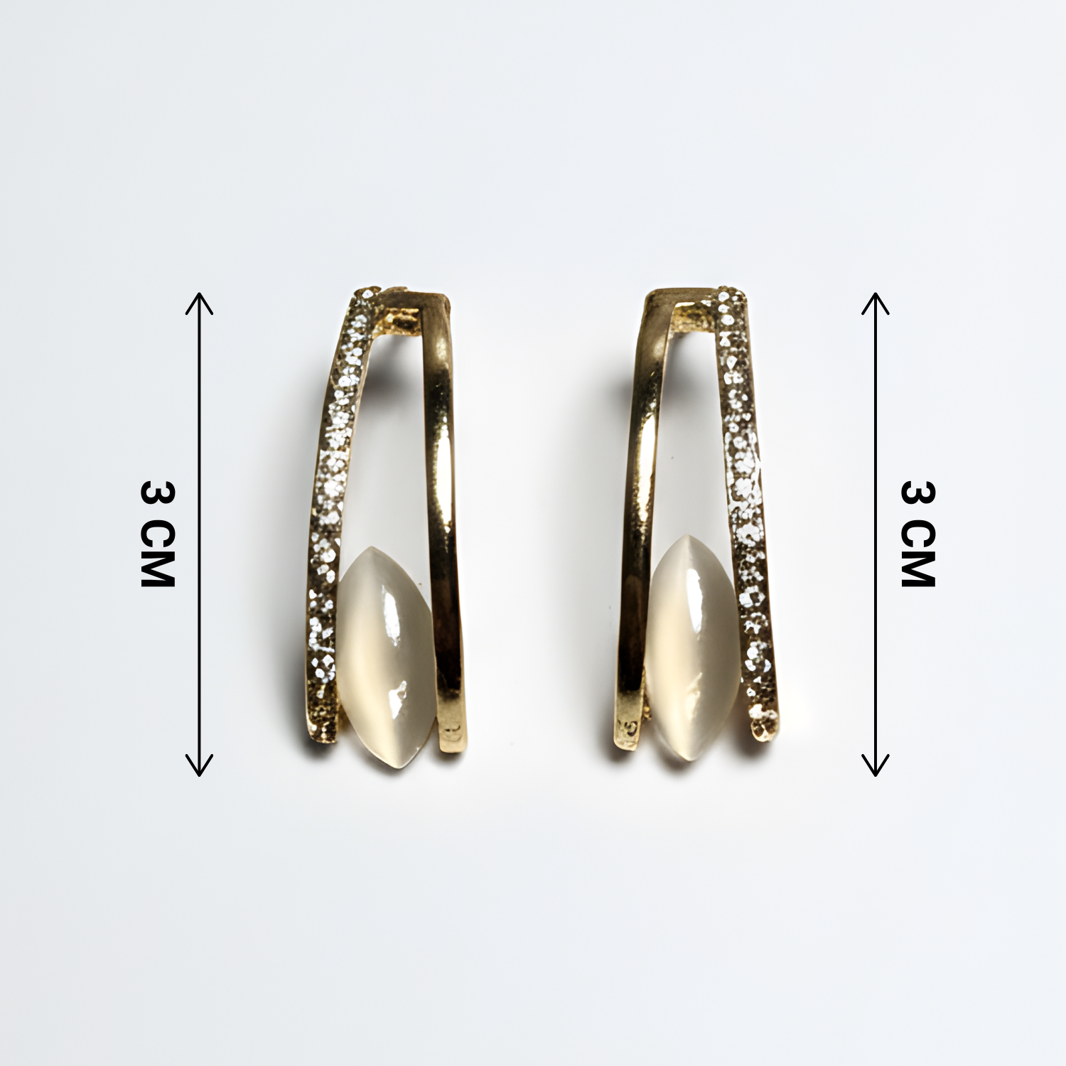 Gold hoop earrings with embedded stones and measurements on a white background