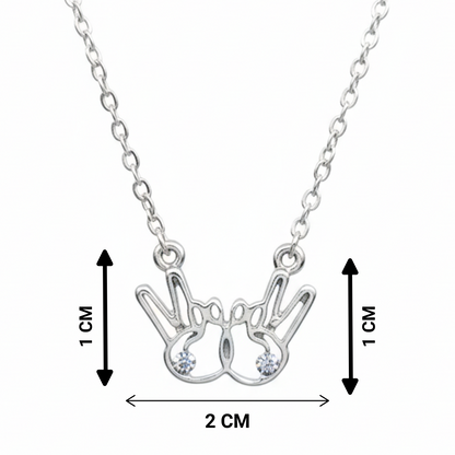 Silver necklace with a crown pendant, shown with measurements on a white background.