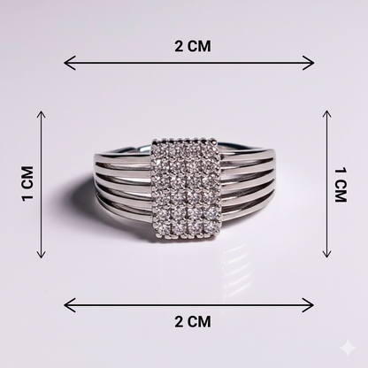 Silver ring with gemstone dimensions shown on a light gray background