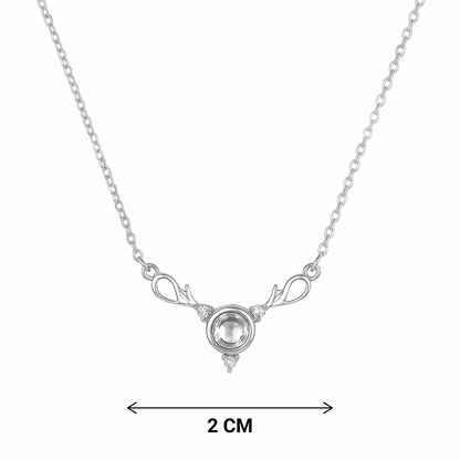 Silver necklace with a circular pendant on a white background