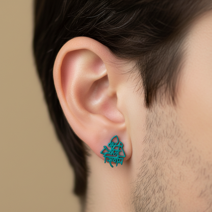Close-up of an ear wearing a turquoise geometric earring against a neutral background