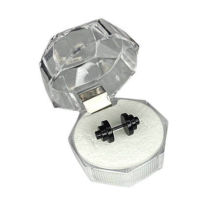 Black earrings in a clear diamond-shaped jewelry box on a white background