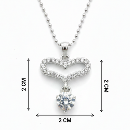 Heart-shaped pendant necklace with a clear gemstone, shown with measurements on a white background.