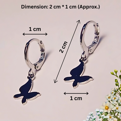 Butterfly-shaped earrings with dimensions indicated on a light background