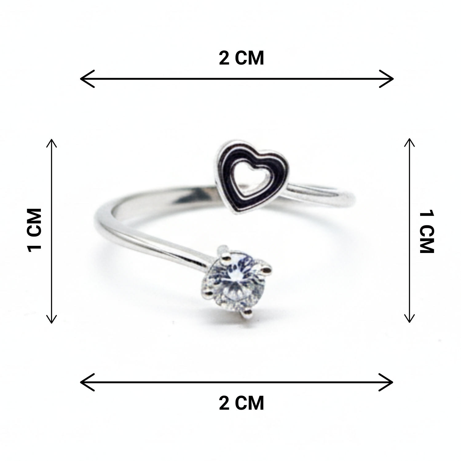 Silver ring with heart-shaped pendant and diamond, shown with measurements on a white background