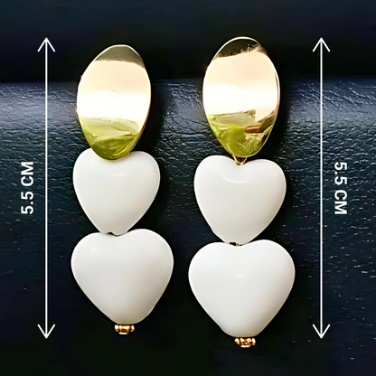 Pair of earrings with heart-shaped beads and gold accents, shown on a dark background with measurements.