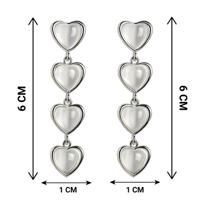 Heart-shaped earrings with measurements on a white background