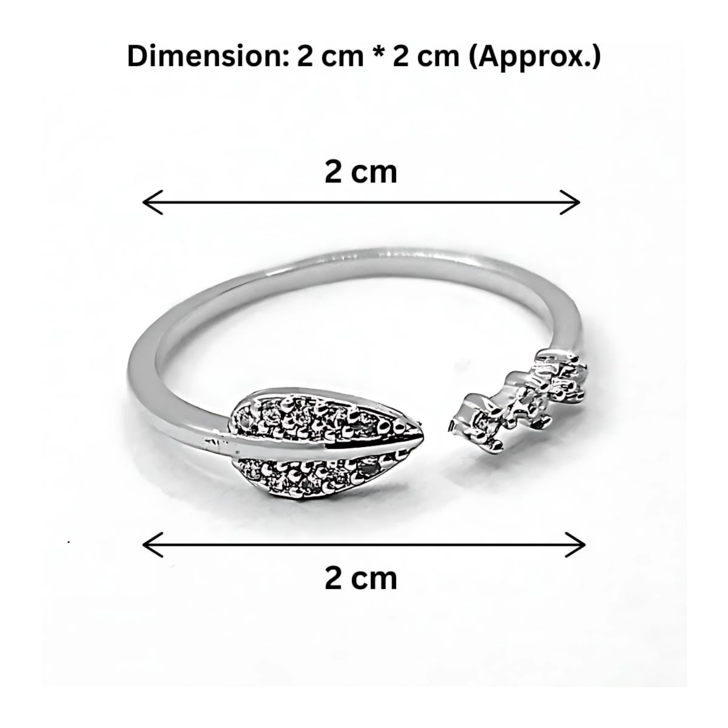 Silver ring with leaf designs and measurements on a white background