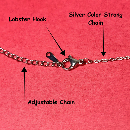 Silver chain bracelet with labeled parts on a pink background