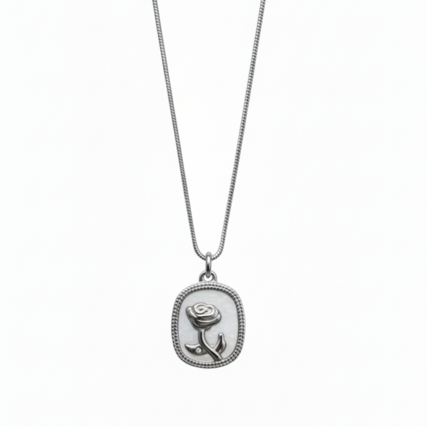 Silver necklace with a rose pendant on a white background