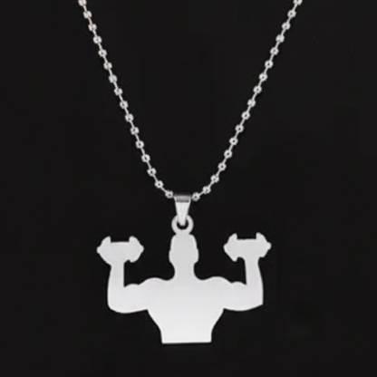 Silver necklace with a pendant of a muscular figure lifting weights on a black background