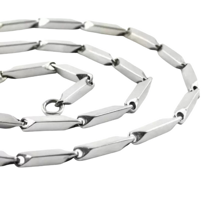 Silver chain necklace on a white background