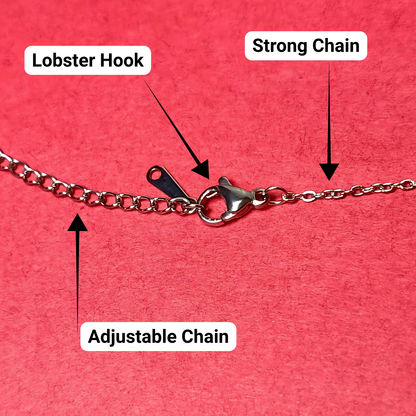 Chain necklace with labeled lobster hook, strong chain, and adjustable chain on a red background