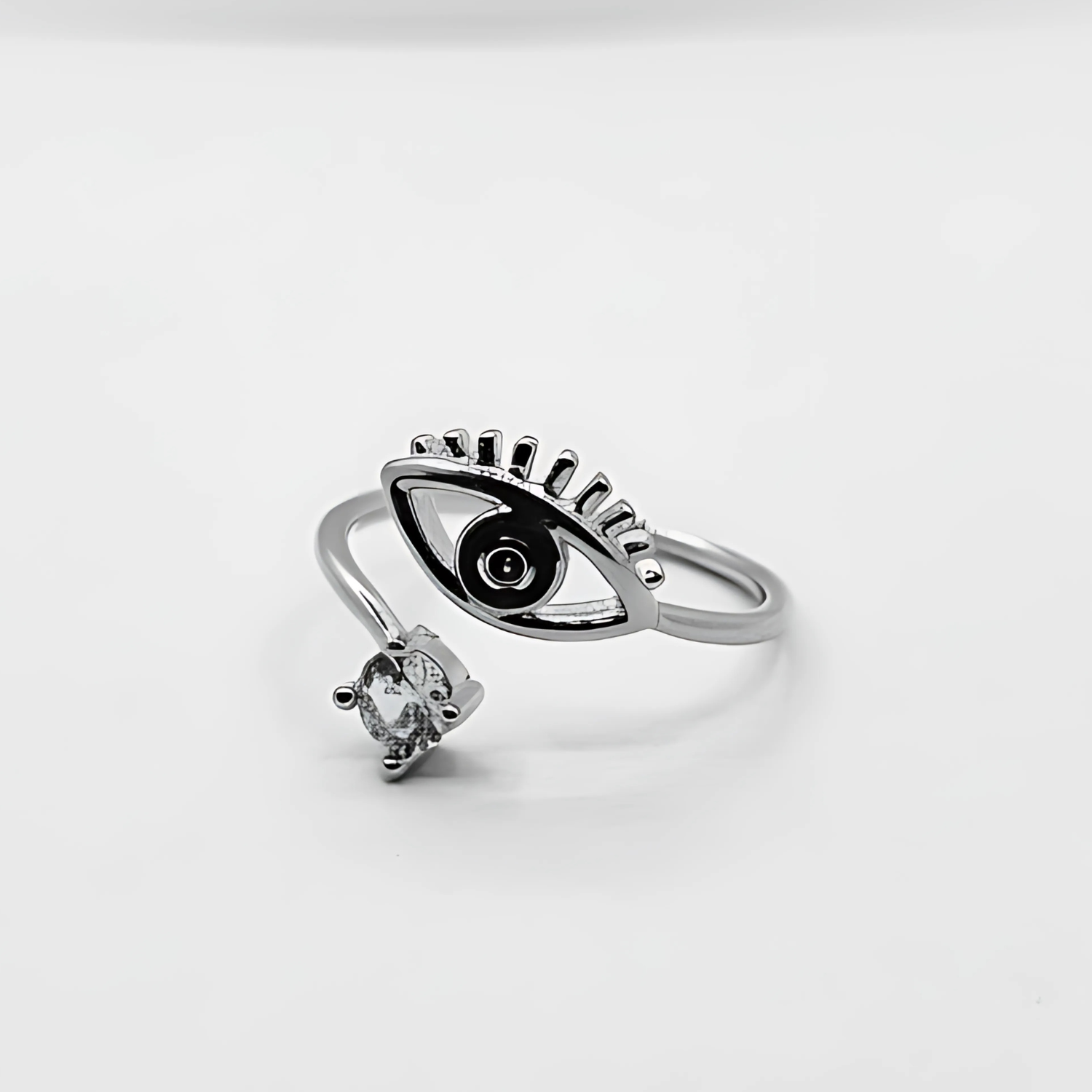 Stylish eye black and small diamond ring silver color on white background