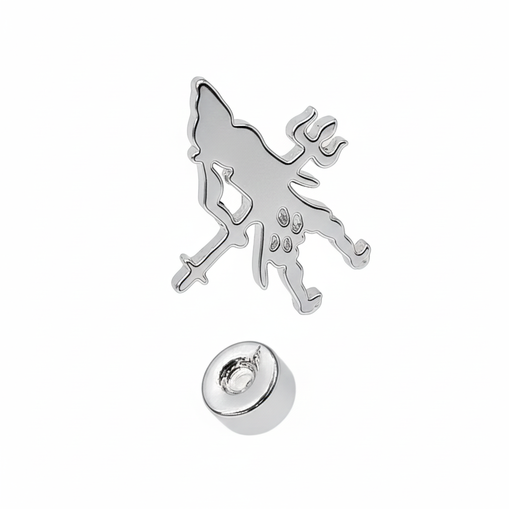 Silver charm with a wolf design on a white background