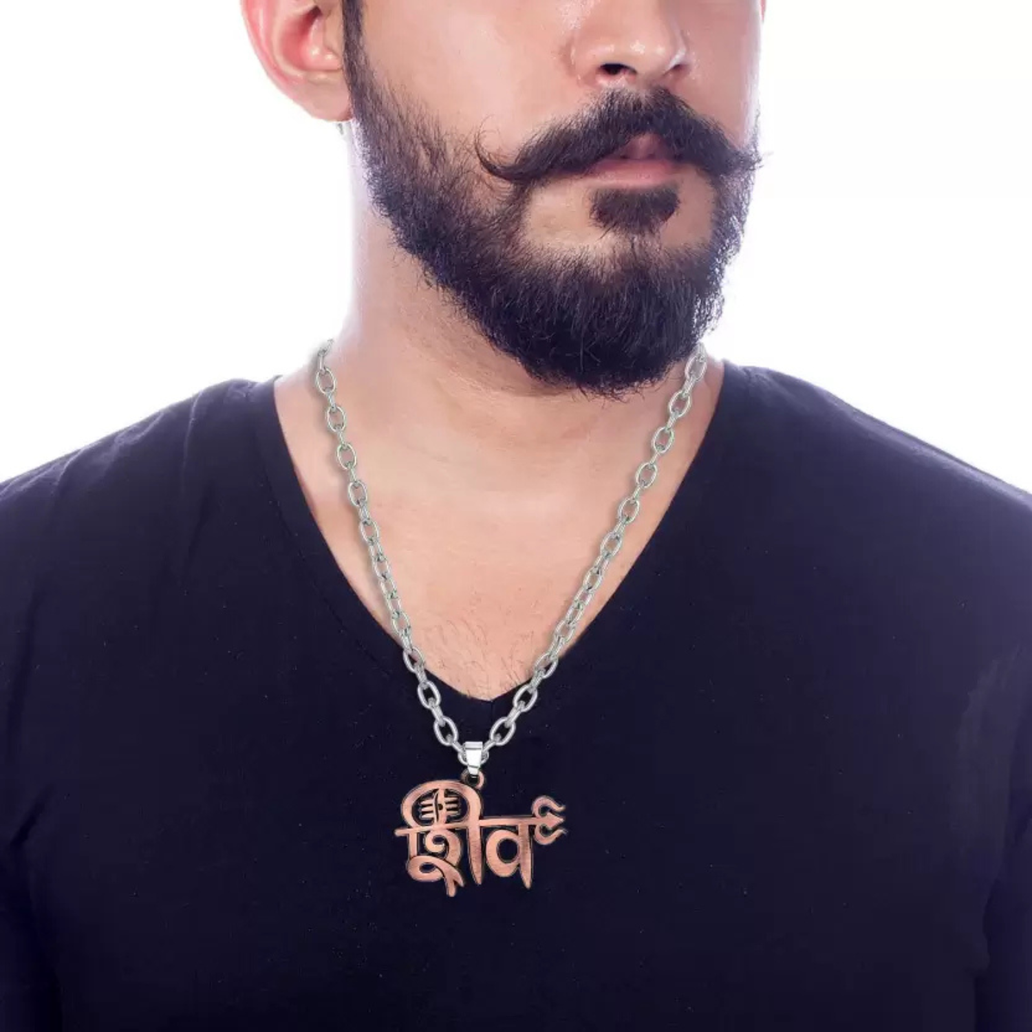 Man wearing a black shirt with a silver chain necklace featuring a 'Shiva' pendant.