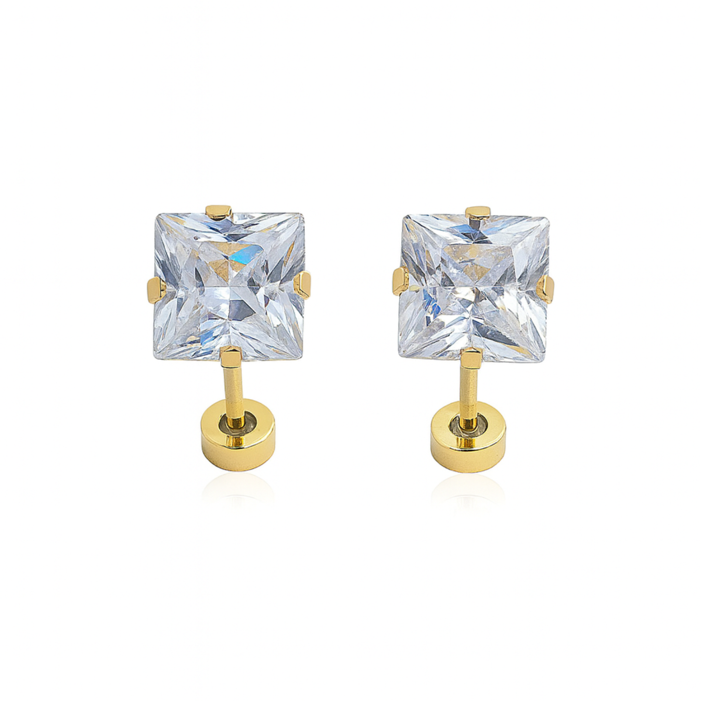 Gold earrings with clear square gemstones on a white background