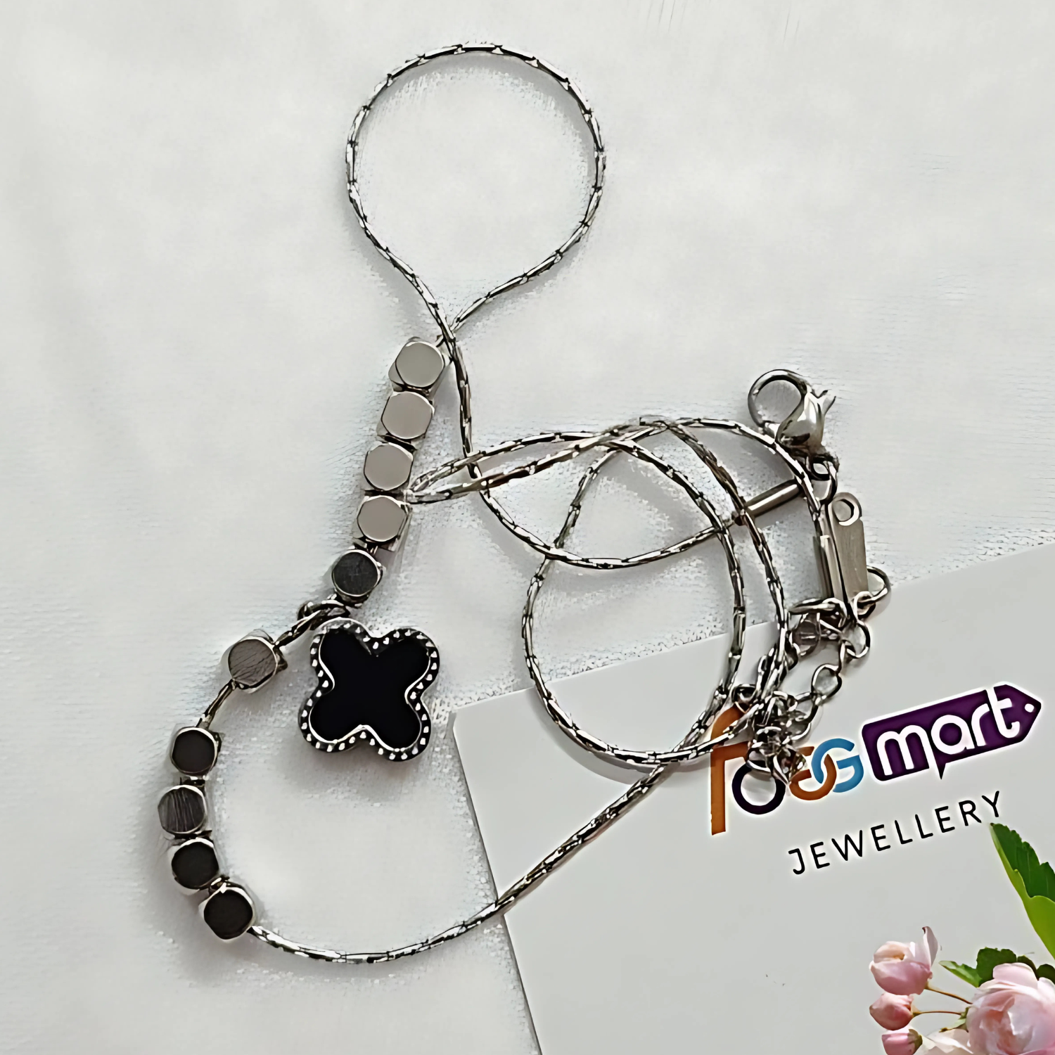 Silver keychain with black butterfly charm on a white background with 'Foggmart' branding.