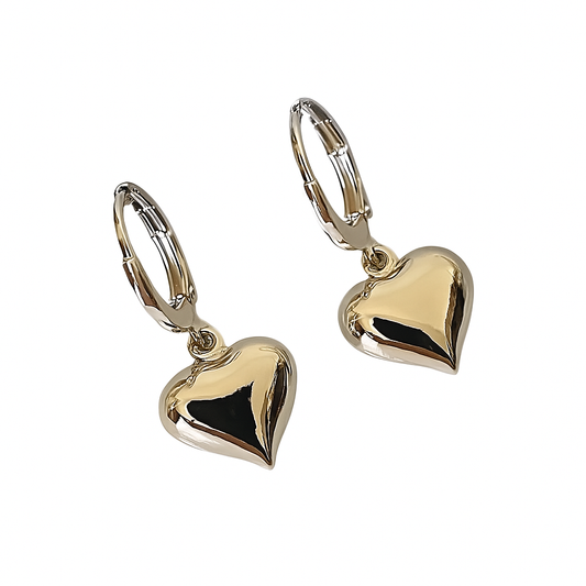 Silver heart-shaped earrings on a white background